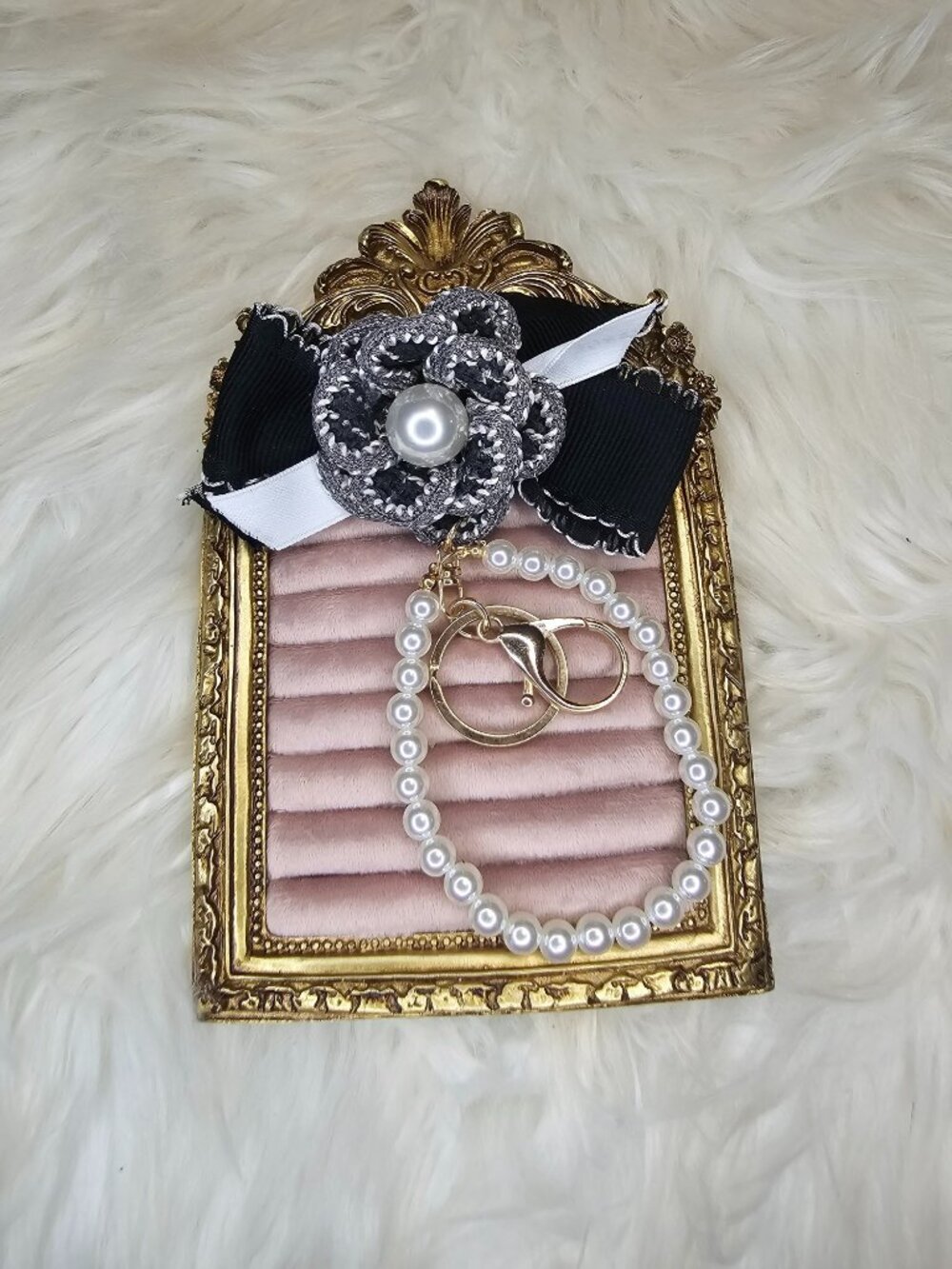 Black Bag charm/keychain/wristlet. You can wear it in different ways. NWOT